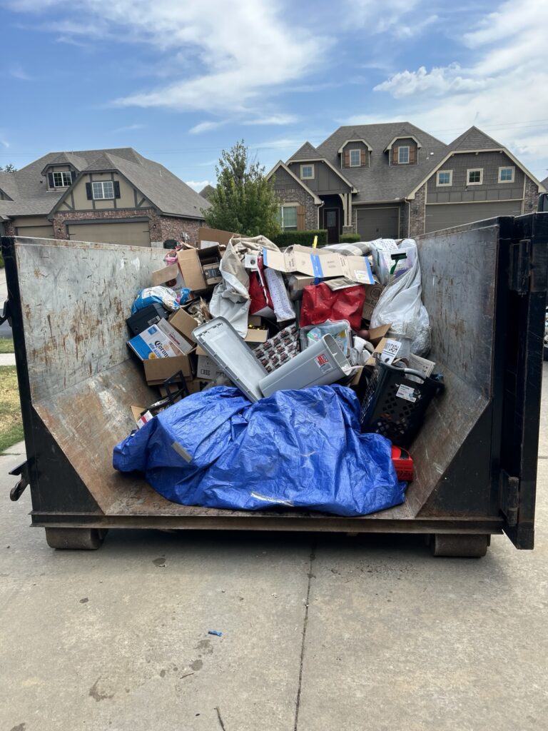 Junk Free 20-yard dumpster containing household cleanout items