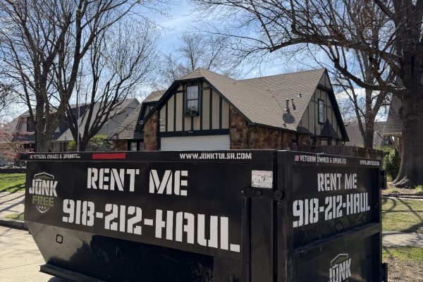 Junk Free 15-yard dumpster in front of a house